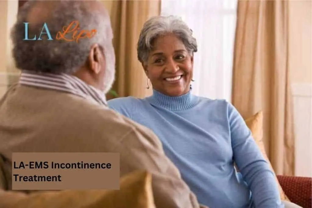 Couple sat smiling at each other - LA-EMS treatment Ledbury